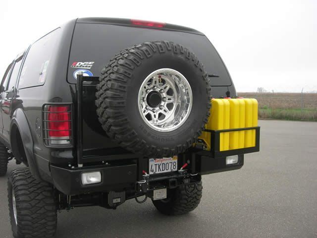 Ford excursion swinging spare tire carrier